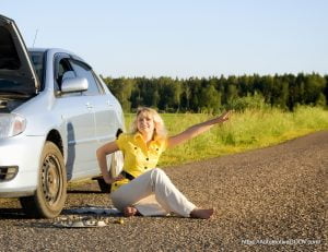 Woman with Broken Car